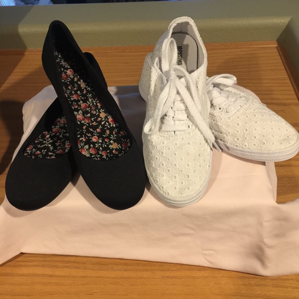 1 black suede shoe & 1 white eyelet shoe